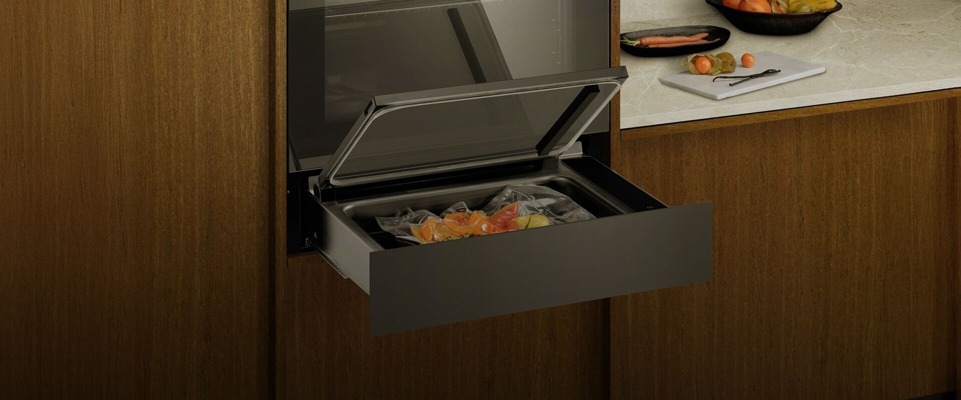 Integrert vakuumpakker i et trekjøkken